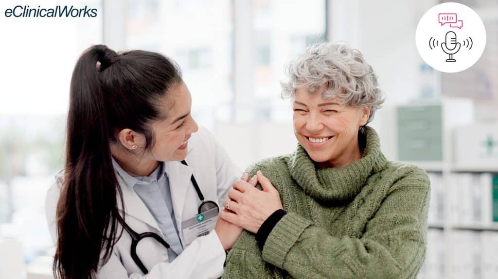 woman doctor and woman patient smiling together in office. Small microphone icon in white circle in top right circle of the photo.